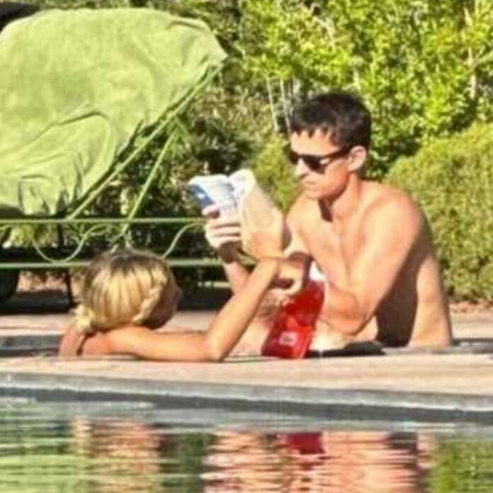 PHOTO: Zendaya and Tom Holland switching books while reading by the swimming pool side