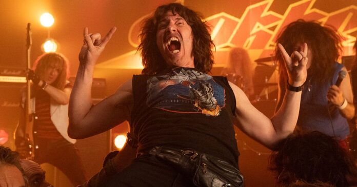 Deaner ’89 Interview: Paul Spence and Will Sasso throw up their horns for the origin story of a rock ‘n’ roll legend in the making